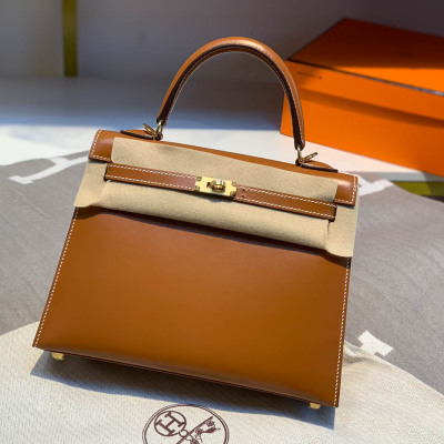 HERMES    Kelly golden brown with gold buckle