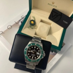 Rolex Green Submariner watch, the beauty of the ocean on your wrist.