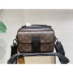 Messenger bag with trunk-style leather handles and LV logo shoulder strap